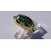 Oval Cut Channel Set Emerald Ring in 18k Yellow Gold