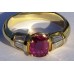 Oval Cut Ruby with Baguette Diamond Ring in 18k Yellow Gold