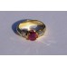 Oval Cut Ruby with Baguette Diamond Ring in 18k Yellow Gold