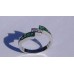 Channel Set 0.16 ctw Diamond and Emerald Bypass Ring in 18k White Gold
